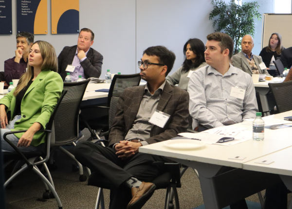 People listening to a presentation at the Accelerator Centre