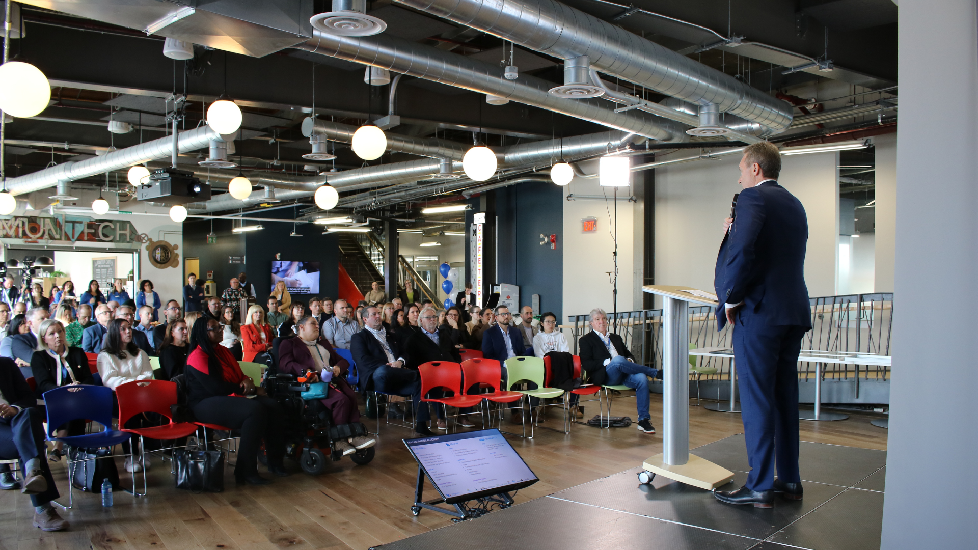 Tony La Mantia speaking to a crowd