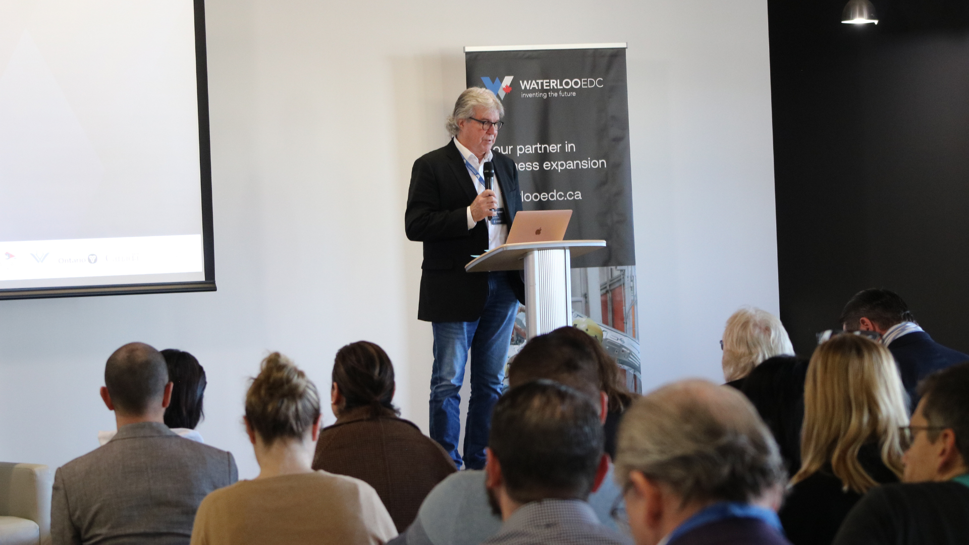 David Fransen delivering the introduction at Waterloo EDC's Public Information Meeting